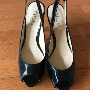 Black guess open toed platform pumps!